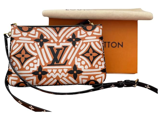 Louis Vuitton, Limited Edition Crafty lined Zip Pouch. Black