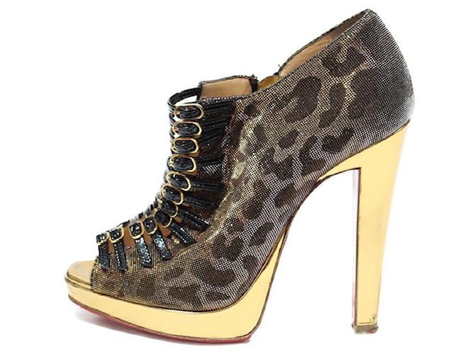 Christian Louboutin Ankle Boots Leopard print Cloth  ref.512533
