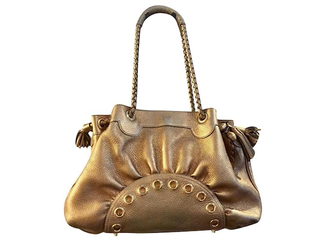 Anya Hindmarch golden shoulderbag with tassle and charms Leather  ref.513659