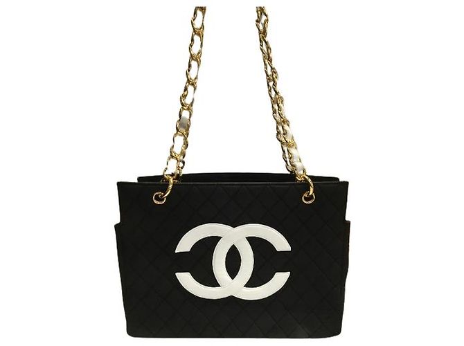 Bolsa Tote Chanel de lona preta com corrente dourada