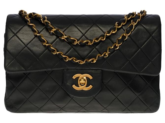 El codiciado bolso Chanel Timeless 23 cm con solapa forrada en cuero negro, guarnición en métal doré  ref.515813