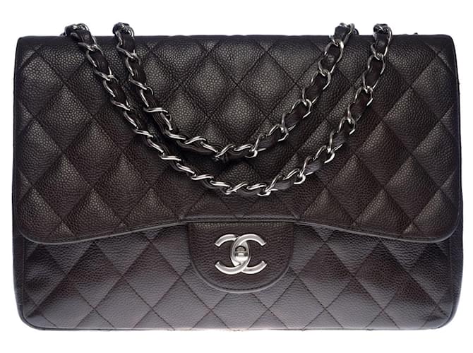 Majestic Chanel Timeless Jumbo Flap bag bolsa de mão em pele de cordeiro caviar acolchoada marrom escuro, Garniture en métal argenté Castanho escuro Couro  ref.515903