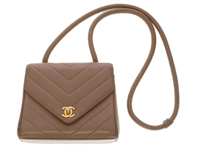 Precioso bolso de mano Chanel Mini Flap bag espiga en piel de cordero color topo, guarnición en métal doré Gris Cuero  ref.515948