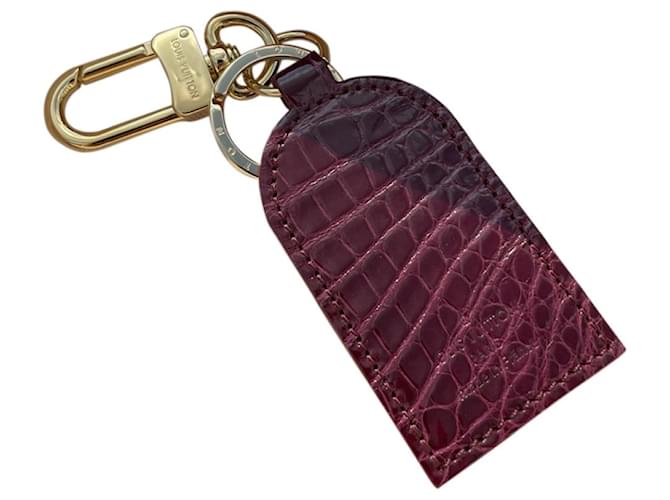 Louis Vuitton Bag charms Dark purple Exotic leather  ref.518353
