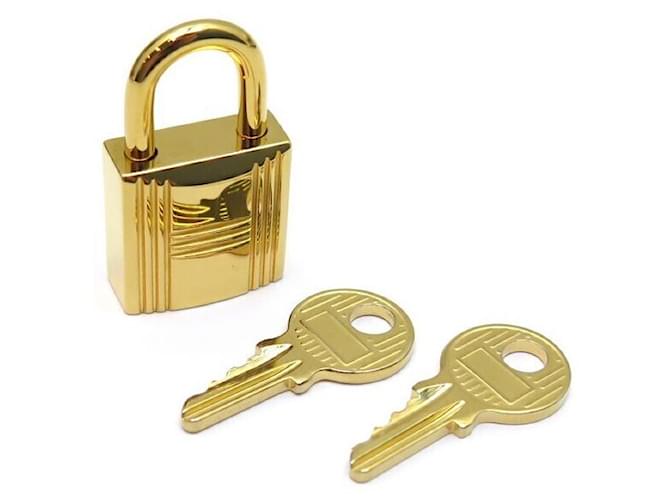 Hermès NEW PADLOCKS HERMES + 2 cles 120 PR KELLY BIRKIN BAG IN GOLD METAL GOLD PADLOCK Golden  ref.521298