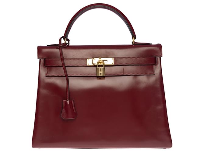 Magnífica bolsa Hermès Kelly 32 devolvido em couro bordô (H vermelho), guarnição de metal banhado a ouro Bordeaux  ref.521752