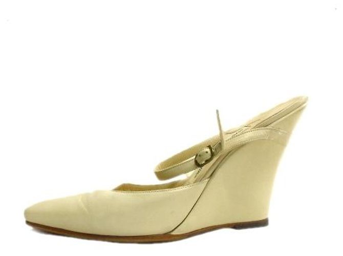 Manolo Blahnik Mulas de cuña
