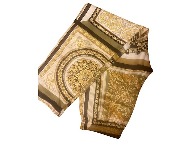 Versace Pantalones, polainas Amarillo Seda  ref.525033