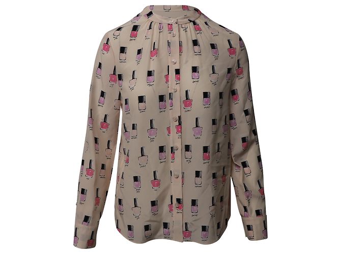 Blusa con estampado de esmalte de uñas de Kate Spade en seda rosa