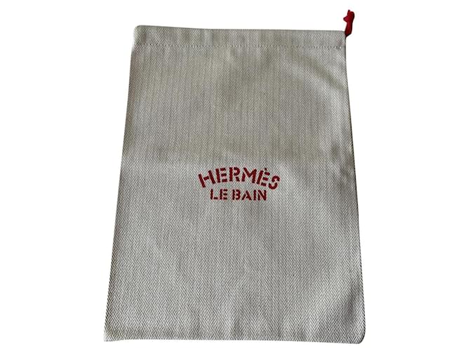 Hermès Clutch bags Red Beige Cloth  ref.528946