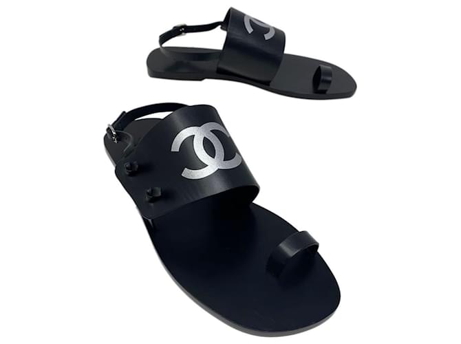 Sandalia de dedo Chanel en piel negra TALLA 38,5 Negro Cuero  ref.536031