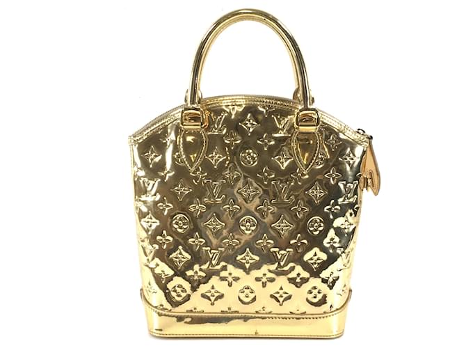 Louis Vuitton Gold Backpacks
