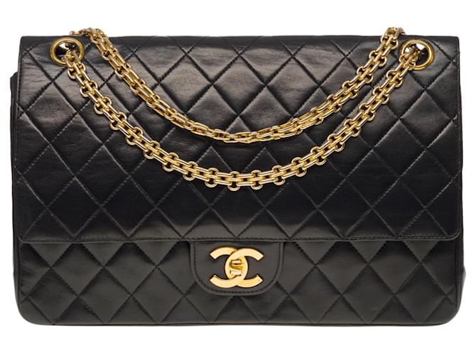 Sublime bolso Chanel Timeless/Classic 27 cm de cuero acolchado negro, guarnición en métal doré Piel de cordero  ref.540055