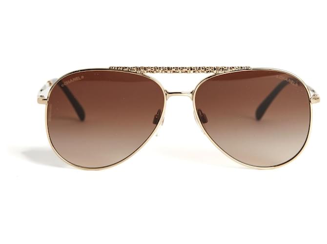 Chanel Óculos de sol Dourado Metal  ref.540188