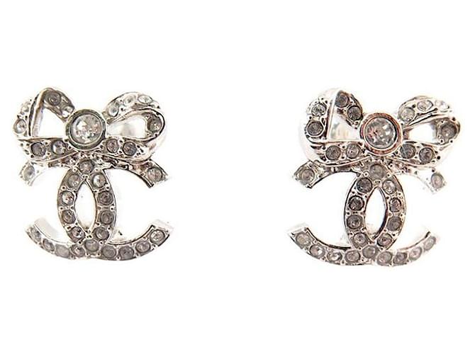 NEW EARRINGS CHANEL LOGO CC BOW AND SILVER METAL STRASS EARRING