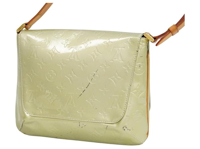 Thompson patent leather handbag Louis Vuitton Gold in Patent