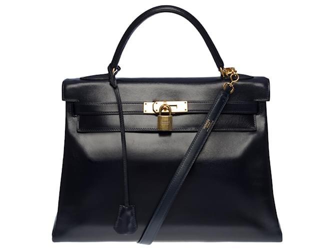 Hermès Splendid Hermes Kelly handbag 28 turned shoulder strap in navy blue box leather, gold plated metal trim  ref.550484
