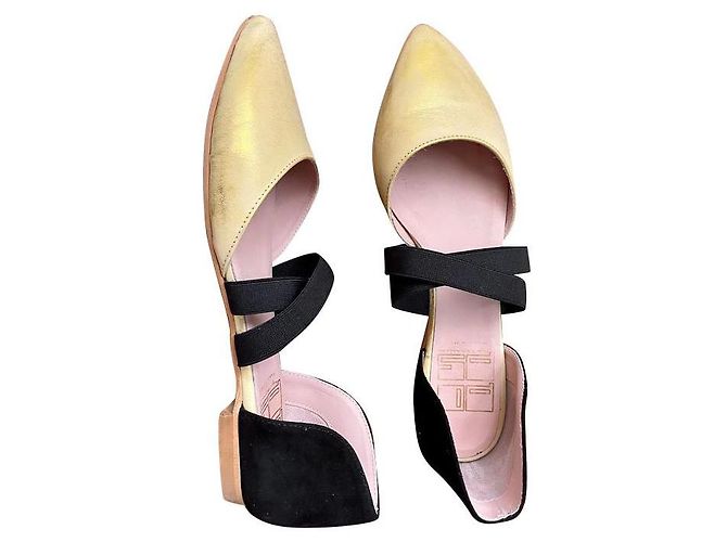 Autre Marque Sandali Popshoes in pelle oro e nero D'oro