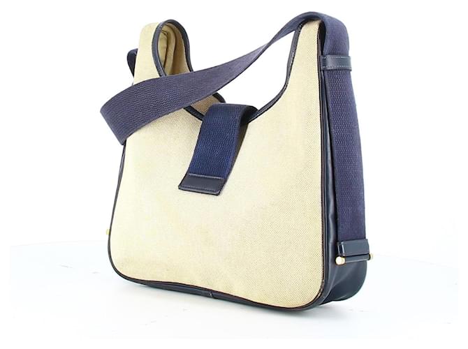 Hermès Vintage Hermes Tsako bi-material shoulder bag in beige canvas & navy blue leather Cotton  ref.557086
