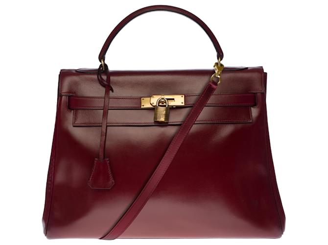 Hermès Muy bonito bolso Hermes Kelly 32 Al revés en cuero box rojo H (Burdeos), adornos de metal chapado en oro  ref.558183