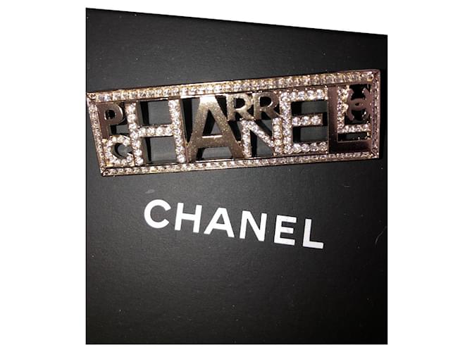 Chanel Alfinetes e broches Dourado Metal  ref.560013