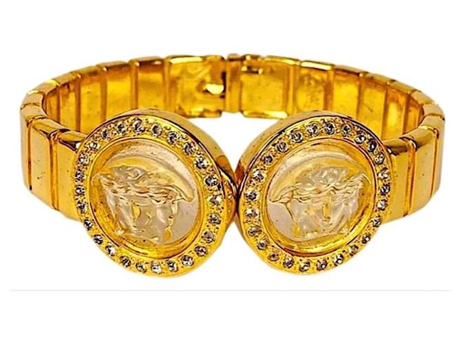 Gianni Versace Vintage Gold Plated Crystal Transparent Medusa Hinged Bangle  Gold hardware Gold-plated ref.561517 - Joli Closet