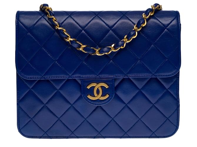 Timeless Magnífica bolsa Chanel Classique Mini Flap em couro matelassê azul royal, garniture en métal doré  ref.563073