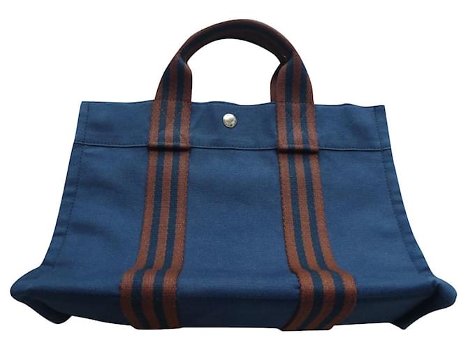 Bolsa hermès modelo toto em estado de nova usada uma vez Azul marinho Lona  ref.563664