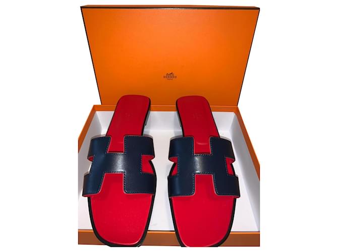 Oran Hermès Sandalias Roja Azul oscuro Cuero  ref.566152