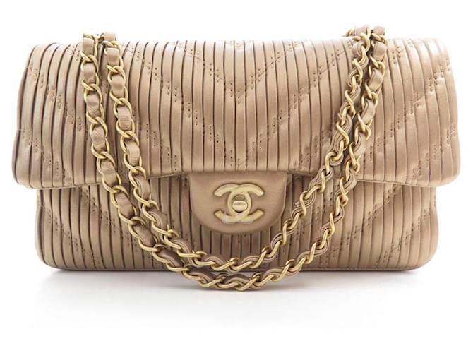 NEW CHANEL CLASSIC TIMELESS M HAND BAG GOLD CHEVRON LEATHER NEW HAND BAG Golden  ref.566204