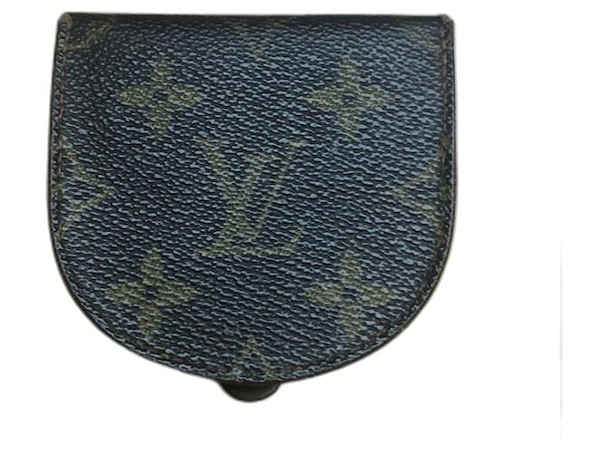 Portemonnaie mit Schale von Louis Vuitton Braun Leder  ref.566994