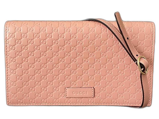 Bolso bandolera Gucci Micro Guccissima de piel rosa