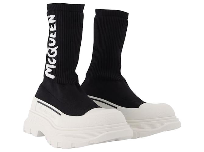 Alexander Mcqueen Zapatillas deportivas Tread Slick en tejido blanco y negro Impresión de pitón  ref.585071