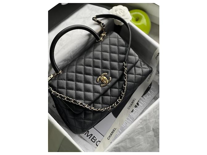 Chanel mittelgroße Coco Handle-Tasche Schwarz Leder  ref.589057