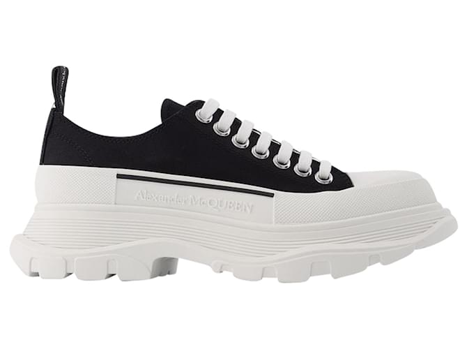 Alexander Mcqueen Tread Slick Sneakers in Black and White Fabric Leather Pony-style calfskin  ref.589445