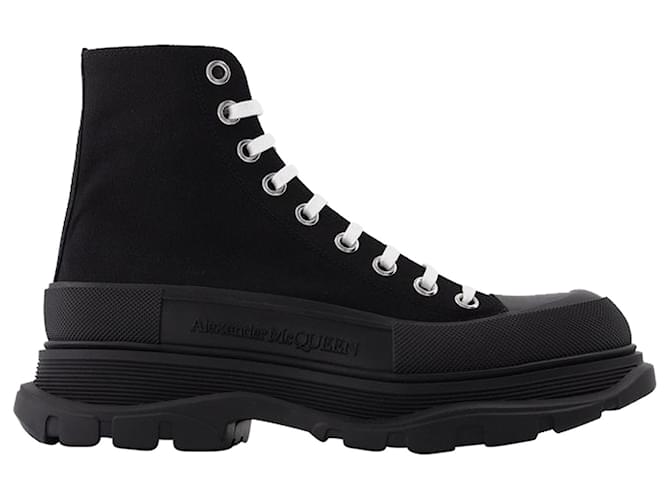 Alexander Mcqueen Tread Slick Boots in Black Leather Cloth ref