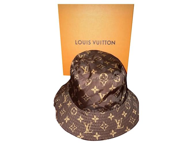 Louis Vuitton Cappello a secchiello con monogramma reversibile Marrone Blu scuro Tela  ref.591305