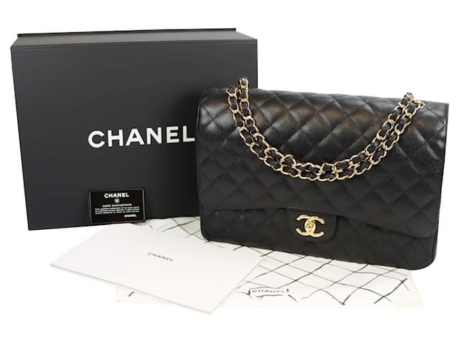 Timeless Chanel Classic gefütterte Klappe Maxi Black Caviar Gold Schwarz Leder  ref.594266