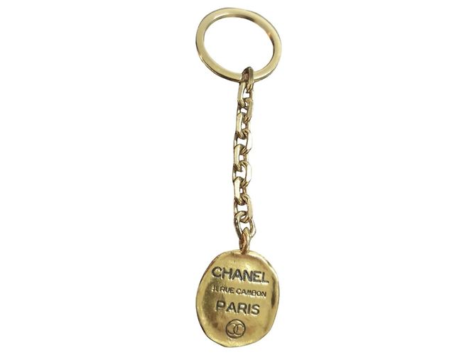 Cambon Chanel Charm de bolsa e chaveiro dourado