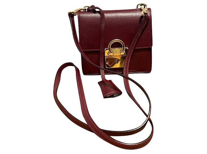 Salvatore Ferragamo Clutch bags Dark red Gold hardware Leather  ref.605427