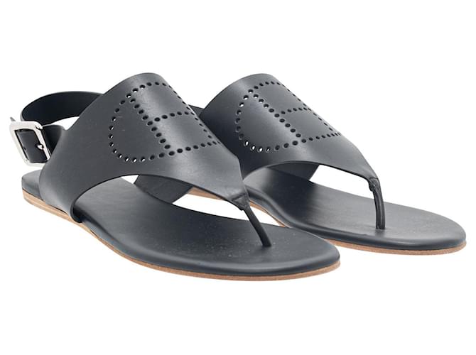 Hermès Flache Slingback-Sandalen aus schwarzem Leder mit Kola-Zapfen  ref.607782