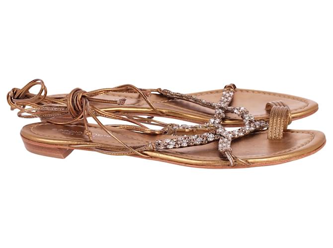 Sandalias con cordones en cuero dorado con adornos de Sergio Rossi  ref.613939