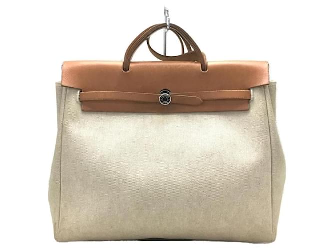 Hermès Handbags Beige Cloth  ref.615482