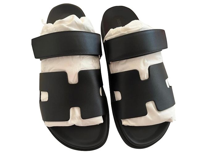 Hermès Zypern Sandalen schwarz Lammleder