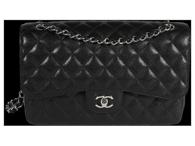 Bolsa Chanel Black acolchoada Caviar Jumbo Classic forrada com aba Preto Couro  ref.617652