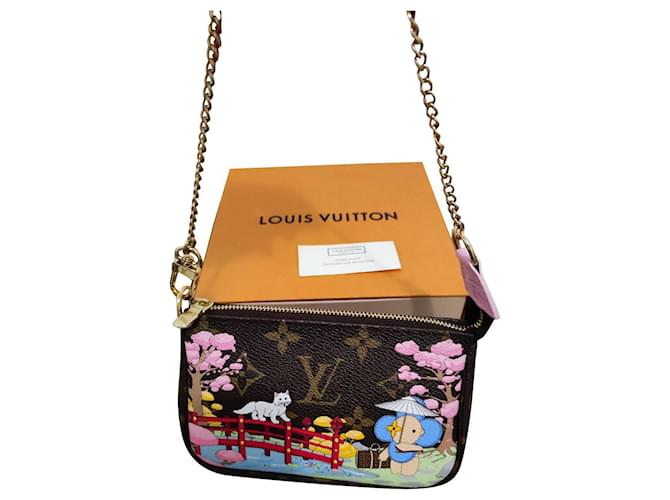 Louis Vuitton Mini bolsa de acessórios Multicor Leatherette  ref.619328