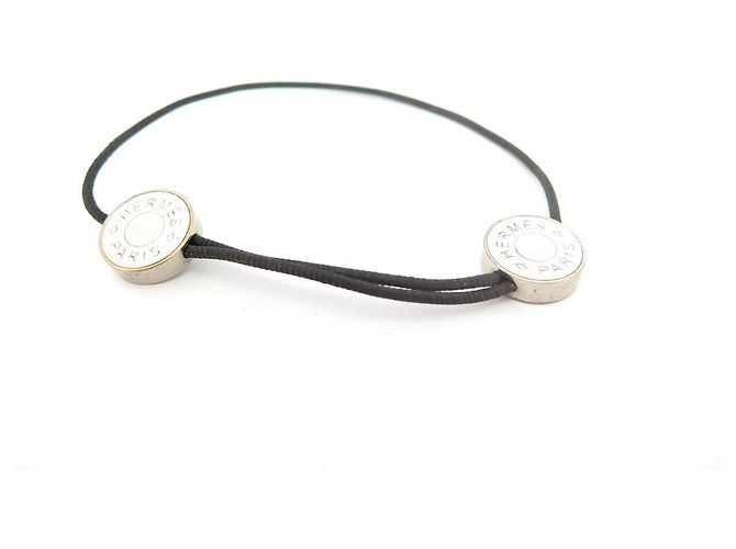 Hermès BRACCIALE HERMES COULISSE foderato CLOU DE SELLE T14-22 BRACCIALE IN ACCIAIO E CORDA Nero