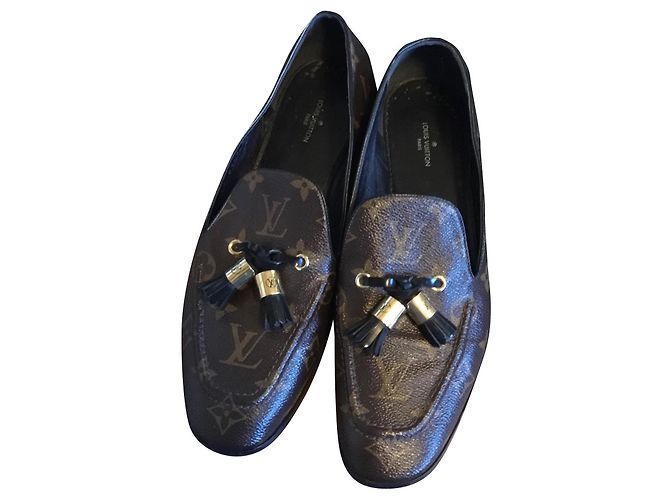 Montsouris Louis Vuitton Mocassins semelle cuir pompons intacts Marron