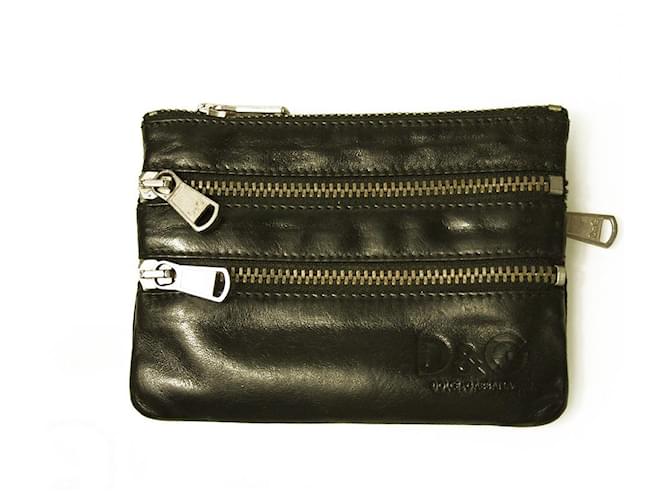 Dolce & Gabbana Geldbörse aus schwarzem Leder mit vier Reißverschlüssen  ref.630891
