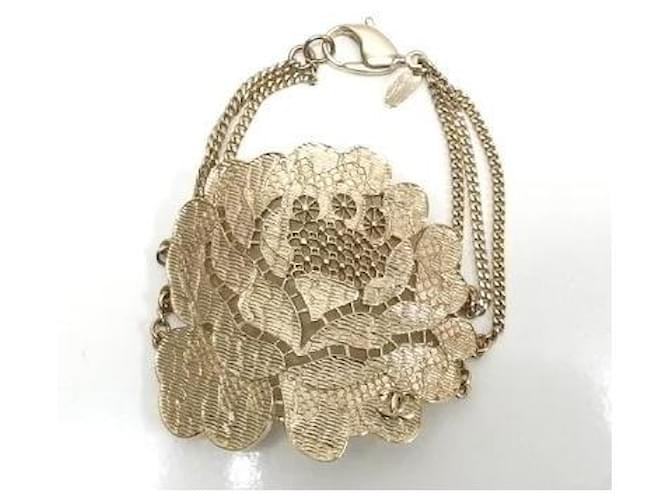 * Bracelet Chanel motif camélia triple chaine Métal  ref.631817